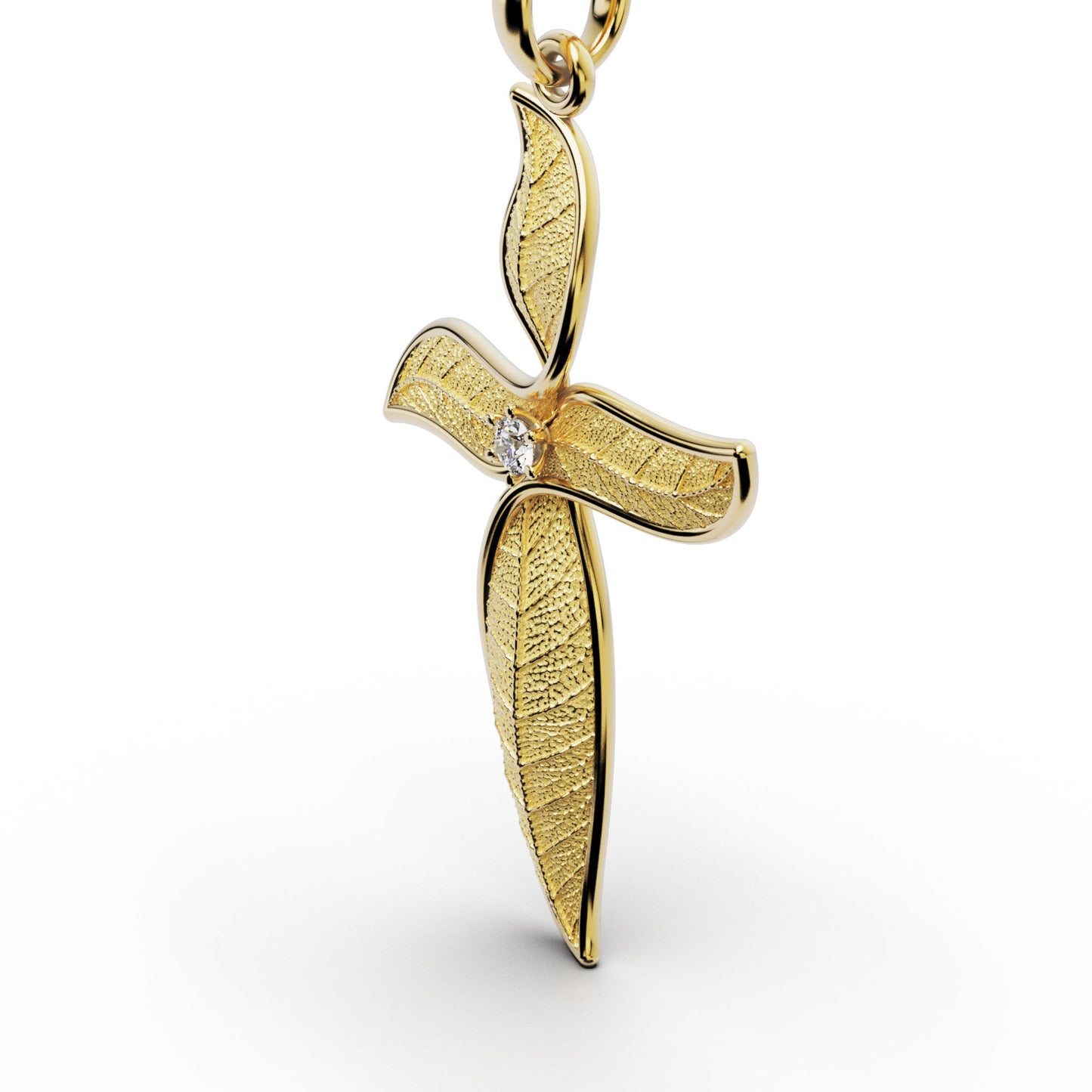 Leaf shaped nature inspired gold cross pendant necklace with natural diamond