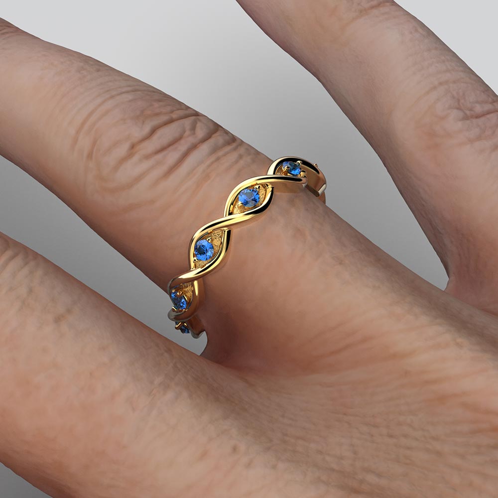 Eternity-Goldring mit blauem Saphir