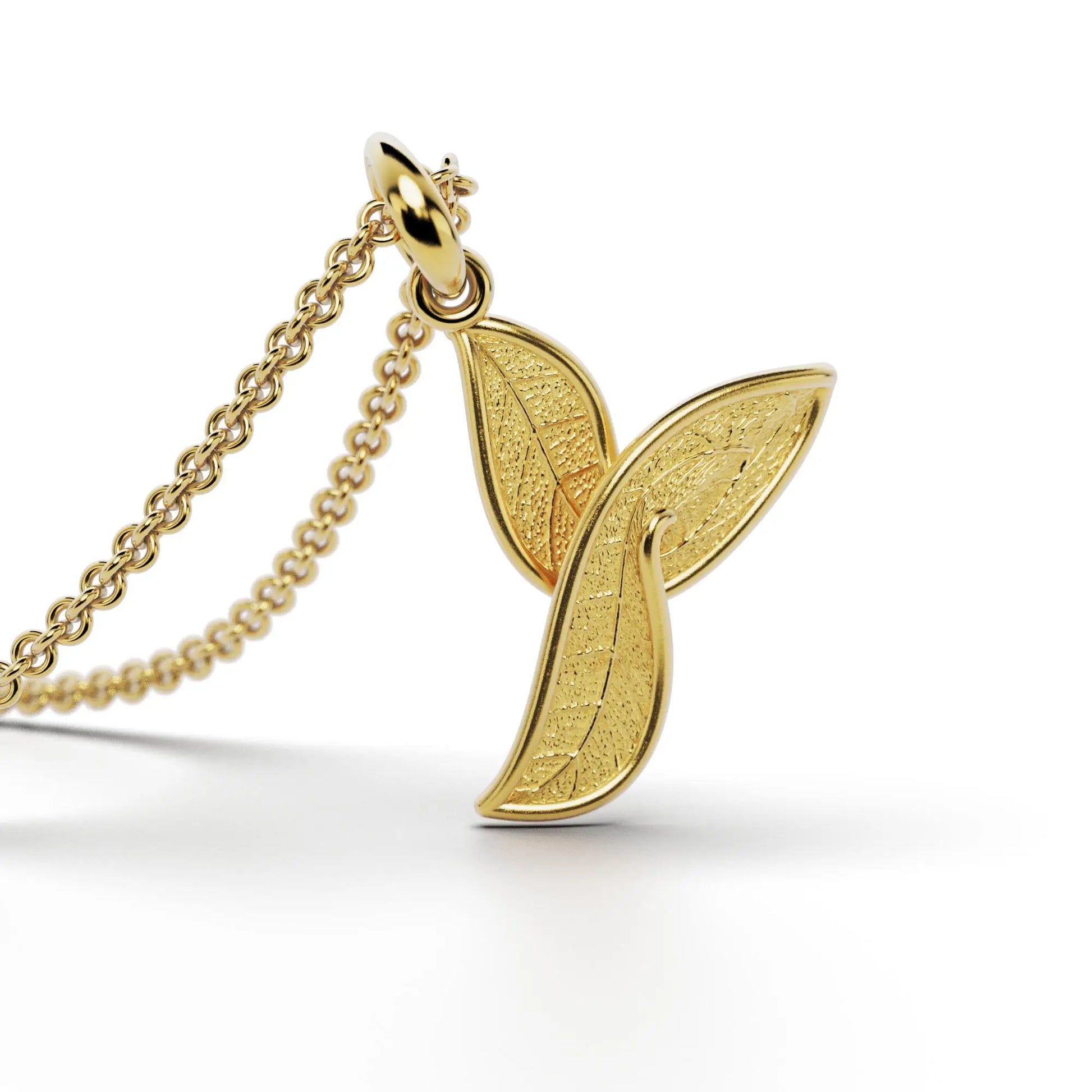 Gold initials pendant with leaf texture, custom made in Italy.
Letter Y