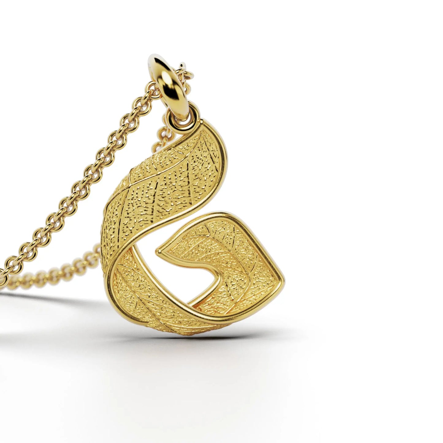 Gold initials pendant with leaf texture, custom made in Italy.
Letter G