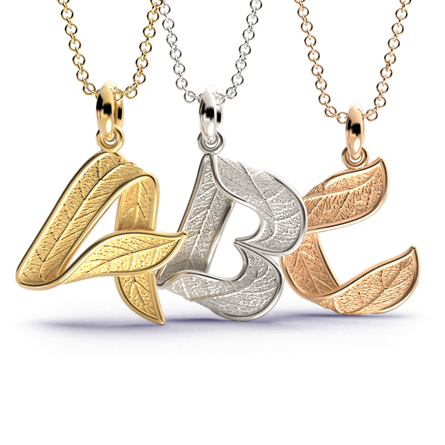 Gold initials pendant with leaf texture, custom made in Italy.