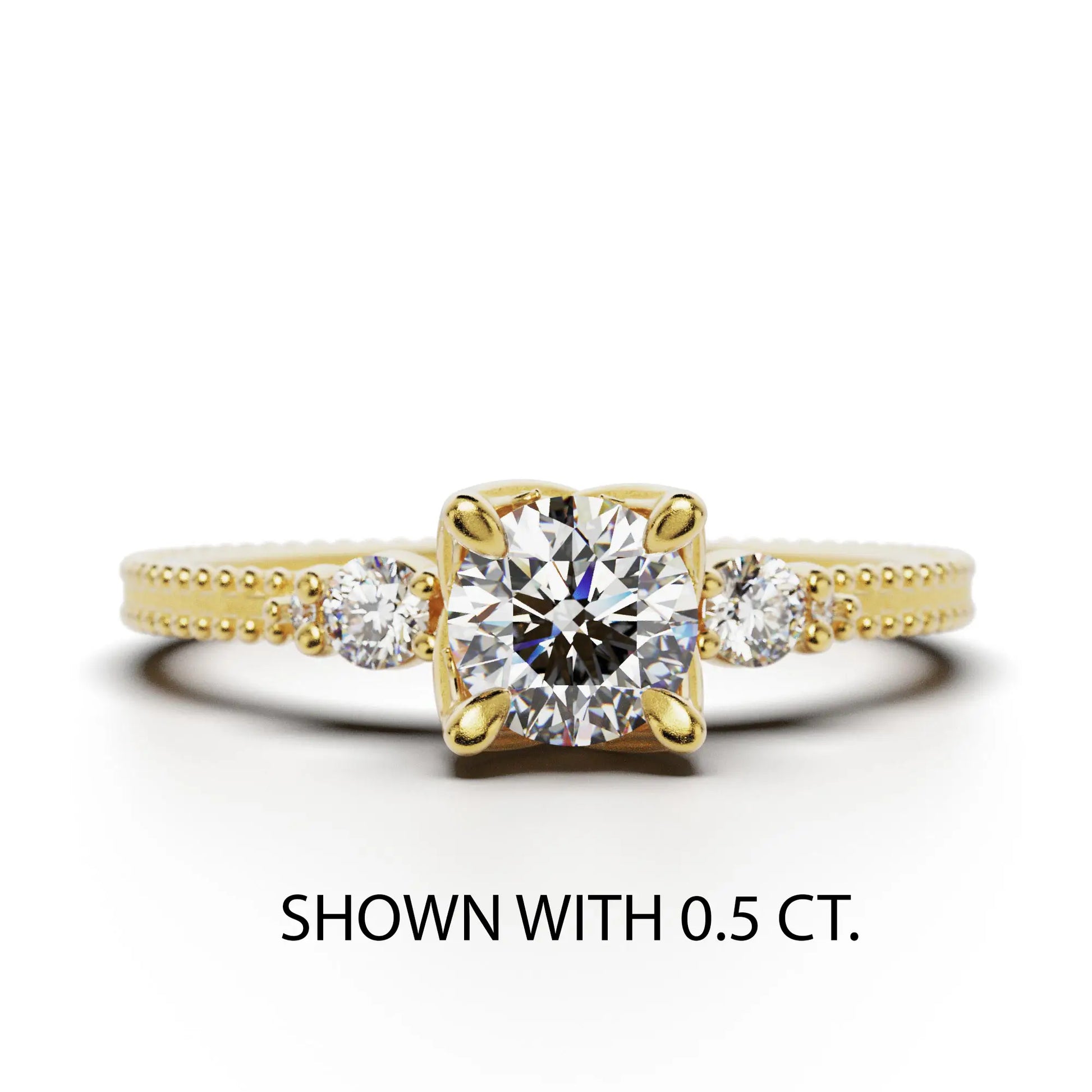 A solitaire diamond ring from the Amore collection, featuring a round-cut diamond in a Venetian-style four-pronged setting. The gold band, available in 14 or 18K, is detailed with milgrane and accented with four smaller diamonds, inspired by Venetian architecture’s timeless romance and artistry.