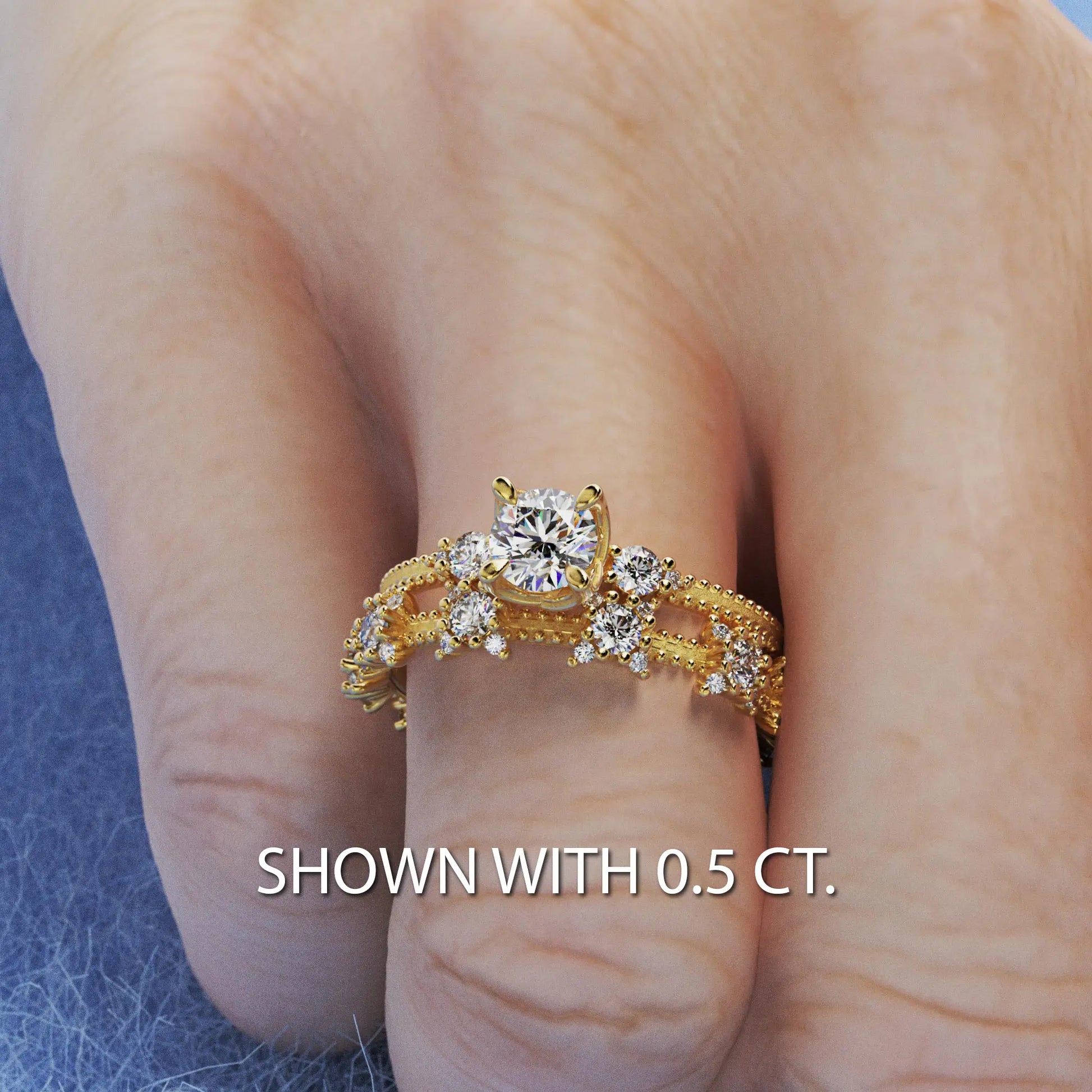 A solitaire diamond ring from the Amore collection, featuring a round-cut diamond in a Venetian-style four-pronged setting. The gold band, available in 14 or 18K, is detailed with milgrane and accented with four smaller diamonds, inspired by Venetian architecture’s timeless romance and artistry.