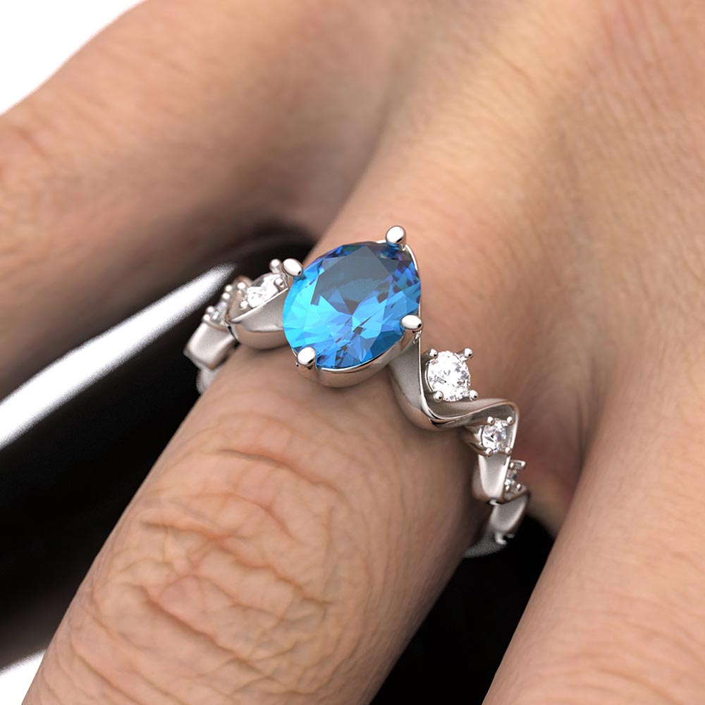 Anello di fidanzamento con topazio blu di Londra e diamanti