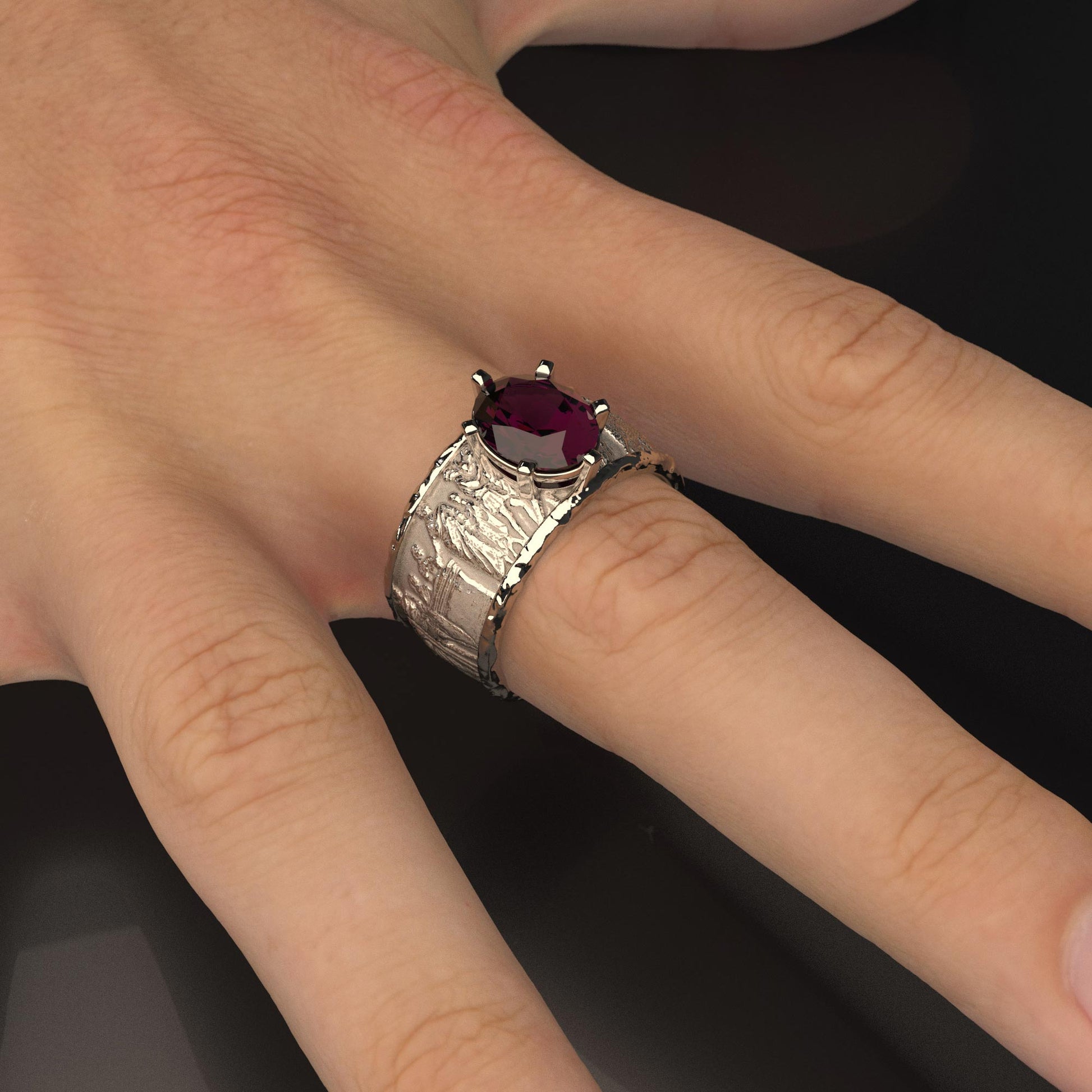 Gold men's engagement ring with a 2.86 CTS Tanzanian Rhodolite Garnet, crafted in Italy in an ancient style. The 18k/14k gold ring features sandblasted and polished finishes, inspired by the Altar of Domitius Ahenobarbus.