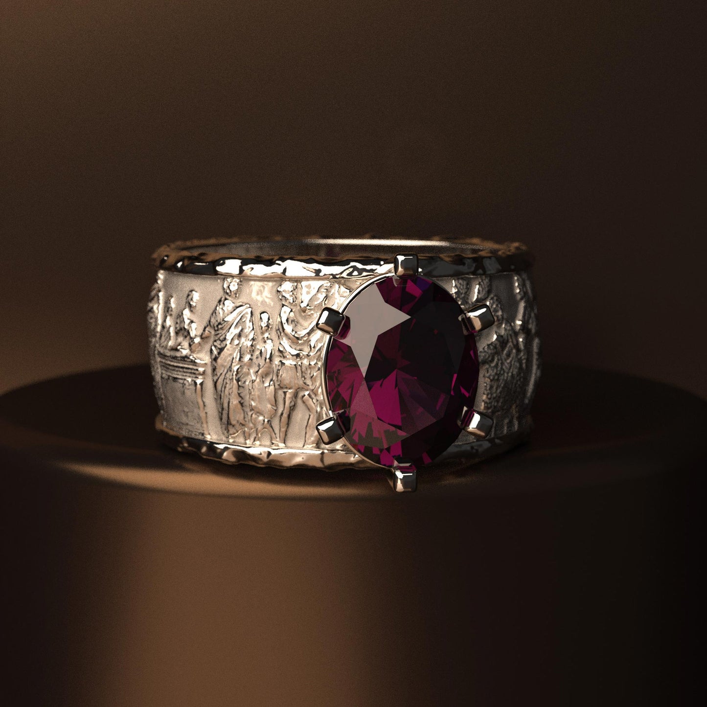 Gold men's engagement ring with a 2.86 CTS Tanzanian Rhodolite Garnet, crafted in Italy in an ancient style. The 18k/14k gold ring features sandblasted and polished finishes, inspired by the Altar of Domitius Ahenobarbus.