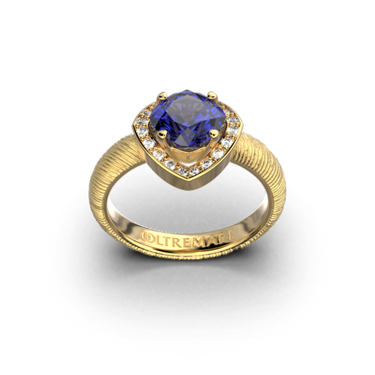 Italian Gold engagement ring with natural cushion tanzanite and natural diamonds.