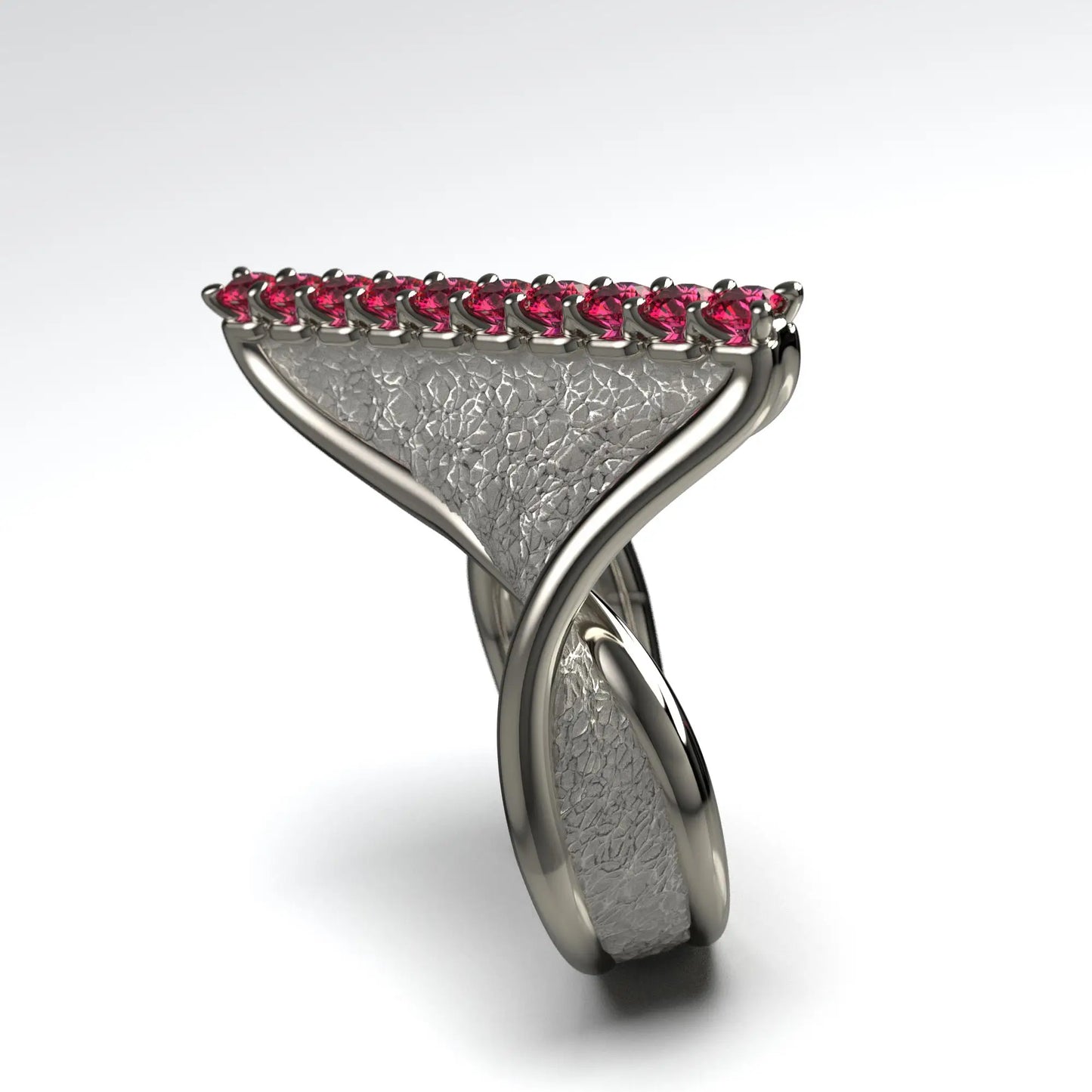 
A modern twisted gold ring with polished edges and an earth-textured surface, featuring 10 round natural rubies set along the top ridge.