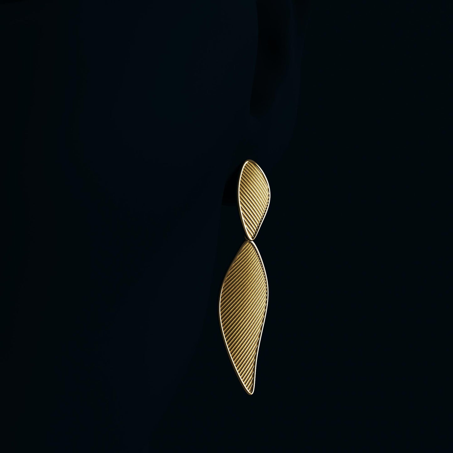 Modern dangle drop earrings in 14k or 18k gold, featuring a ribbed texture and polished edges. Shown in yellow, rose, and white gold variations, measuring 57 mm in length and 19 mm in width.