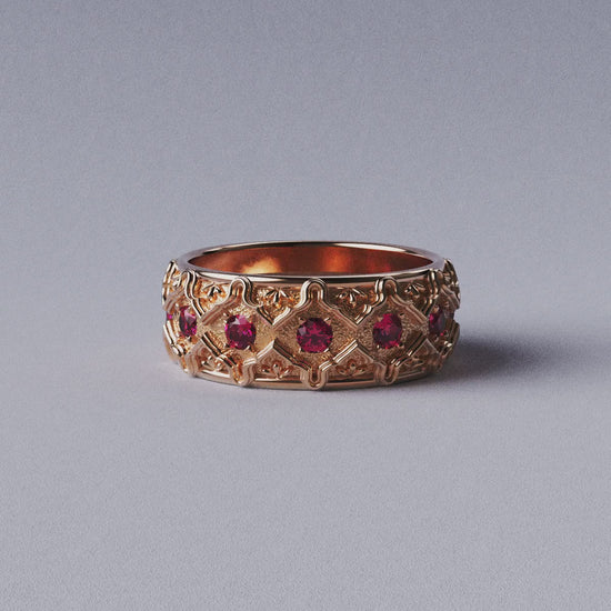 Solid gold wedding band with natural rubies, handcrafted in Italy, featuring a Venetian-style design